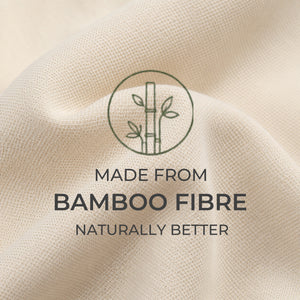 Close-up of a light beige woven fabric with a bamboo line illustration and the text 'MADE FROM BAMBOO FIBRE NATURALLY BETTER' overlaid in the center.