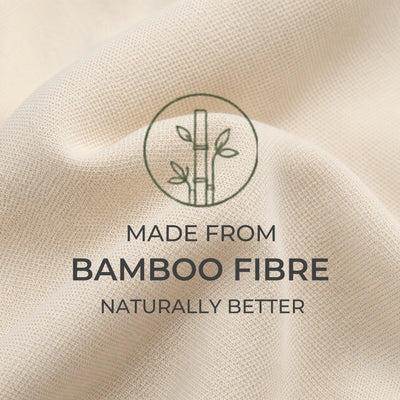 Close-up of a light beige woven fabric with a bamboo line illustration and the text 'MADE FROM BAMBOO FIBRE NATURALLY BETTER' overlaid in the center.
