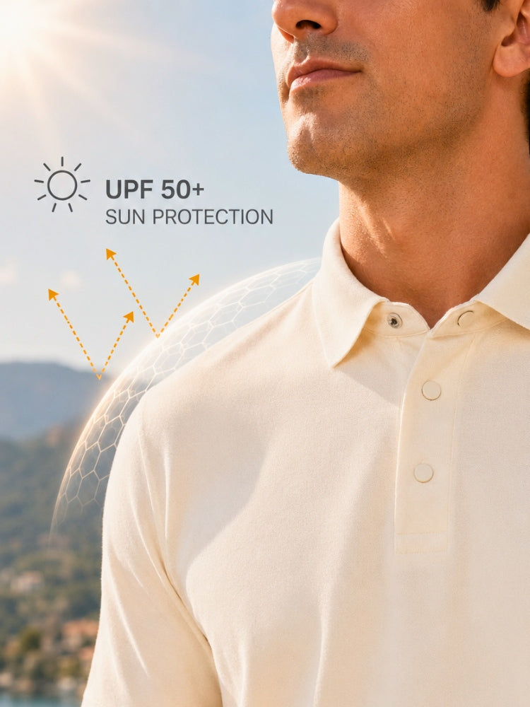 Close-up of a man wearing a light cream polo shirt outdoors, with a sun icon and the text 'UPF 50+ SUN PROTECTION' and a dotted shield graphic indicating sun protection.